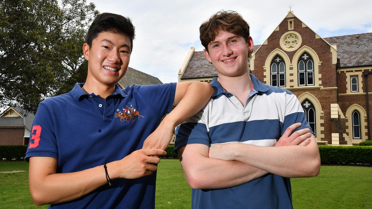 Brisbane Grammar School graduates David Sun and Isaac Robinson. Photo: John Gass.