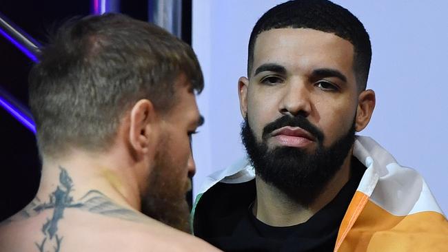 Conor McGregor and rapper Drake attend a ceremonial weigh-in