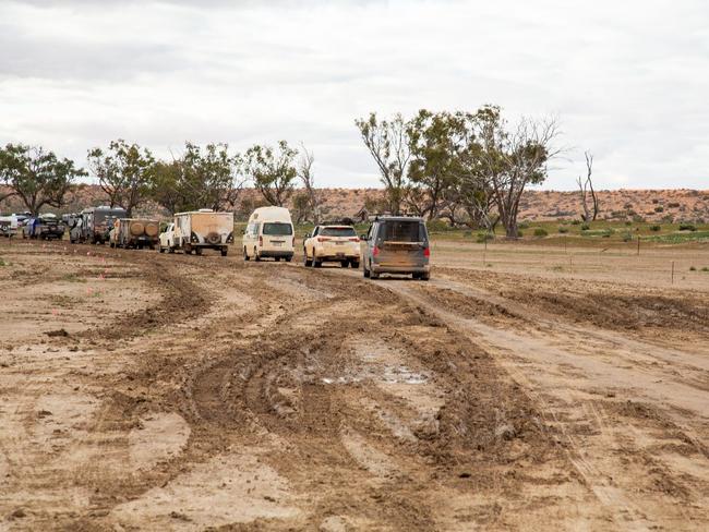 Most vehicles were caked in mud as they arrived. Picture: Danica Clayton