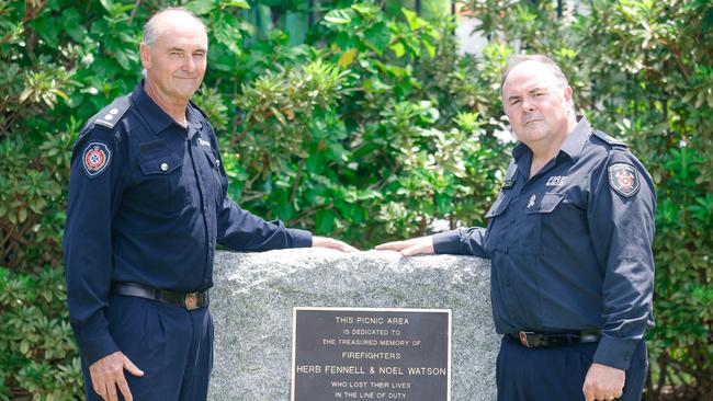 Raymond Ware and Michael Evans pictured next to the Herbie Fennell and Noel Watson memorial stone. Picture: Glenn Campbell