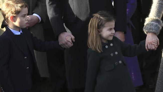 Prince George and Princess Charlotte after attending the Christmas day service. Picture: AP.