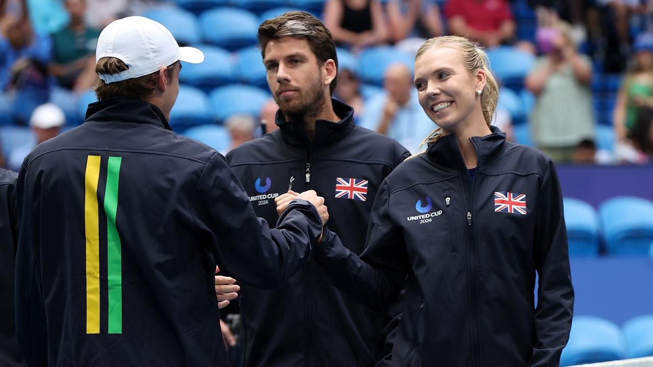 Alex de Minaur of Team Australia and Katie Boulter of Team Great Britain shake hands before their matches. Photo by Paul Kane/Getty Images.