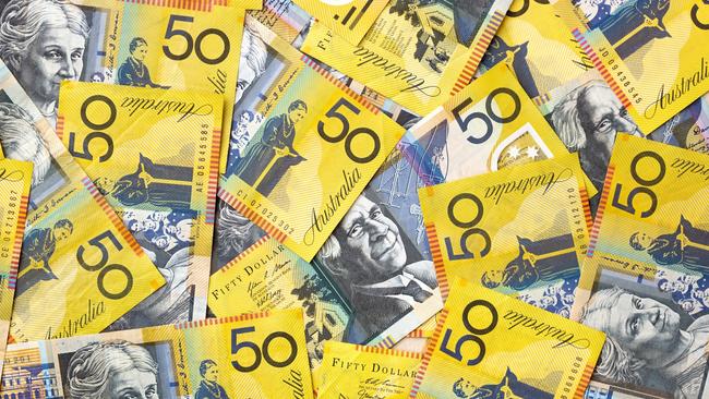 Background of Australian fifty dollar bills.  Full-frame. generic money, notes, cash.