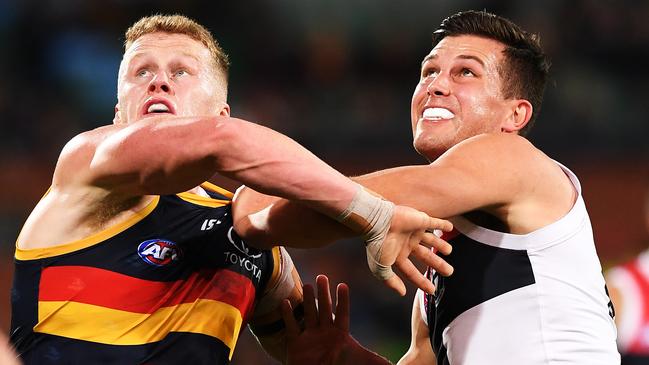 Reilly O'Brien of the AdelCrows rucks against Rowan Marshall of the Saints.