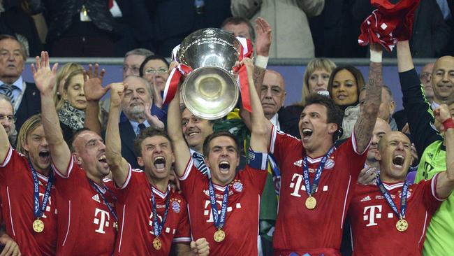 Philipp Lahm lifts the Champions League trophy.