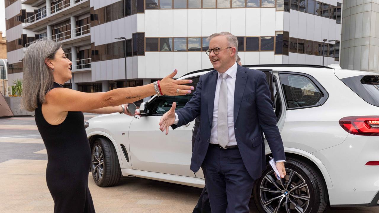The prime minister was met with a hug. Picture: Ben Clark