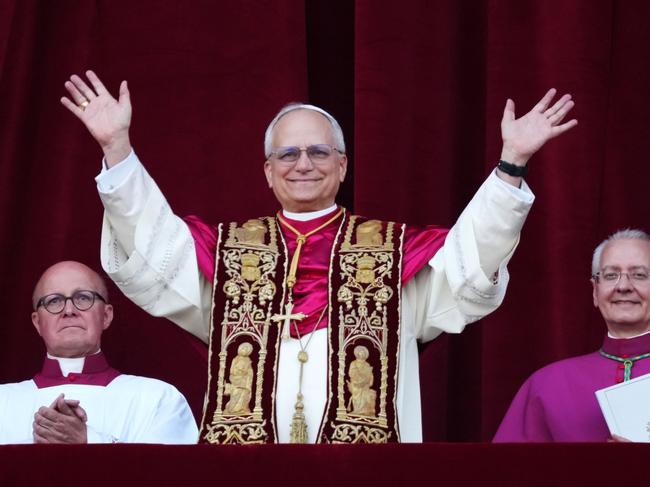 VATICAN CITY, VATICAN - MAY 8: The newly elected Pontiff, Pope Leo XIV is seen for the first time from the Vatican balcony on May 8, 2025 in Vatican City, Vatican. White smoke was seen over the Vatican early this evening as the Conclave of Cardinals took just two days to elect Cardinal Robert Francis Prevost, who will be known as Pope Leo (Leone) XIV, as the 267th Supreme Pontiff after the death of Pope Francis on Easter Monday.  (Photo by Christopher Furlong/Getty Images) *** BESTPIX ***