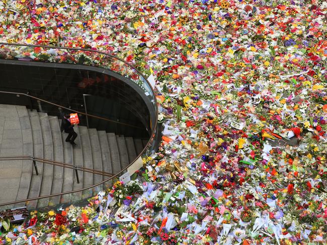 The floral tribute at Martin Place three days after the Lindt Cafe siege ended so tragically. Picture: Toby Zerna