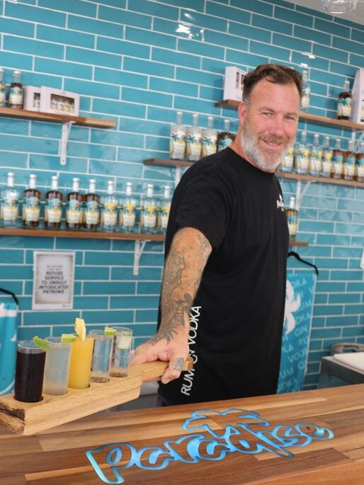 Paradise Rum barman Simon Jones serves up the tasting paddle at the Warana distillery. Picture: Aisling Brennan