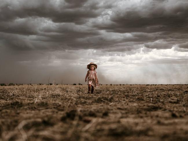 Francesca Hick, 2, of Antrim Station south of Hughenden, only knows a life of drought. Picture: Lindy Hick Photography