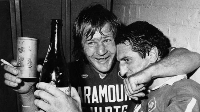 Tommy Raudonikis, left, celebrating.