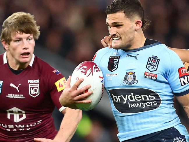 BRISBANE, AUSTRALIA - JULY 13:  Nathan Cleary of the Bluesis tackled during game three of the State of Origin Series between the Queensland Maroons and the New South Wales Blues at Suncorp Stadium on July 13, 2022, in Brisbane, Australia. (Photo by Chris Hyde/Getty Images)