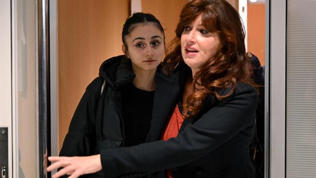 French actor Charlotte Arnould, left, who was the first to file a criminal complaint, leaves the courtroom of the trial of Depardieu. Picture: AFP