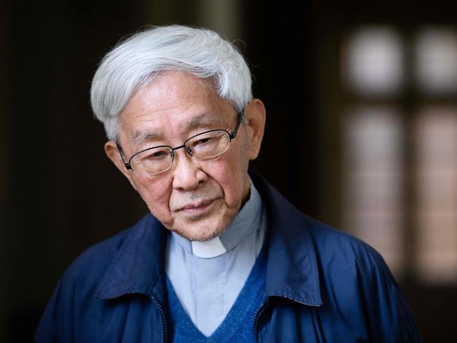 (FILES) In this file photo taken on March 5, 2018, Cardinal Joseph Zen, 86, former Bishop of Hong Kong, listens to a question during an interview with AFP in Hong Kong. - The arrest of 90-year-old retired Catholic cardinal Joseph Zen under Hong Kong's national security law has triggered international outrage and deepened concerns over China's crackdown on freedoms in the financial hub. (Photo by Anthony WALLACE / AFP)