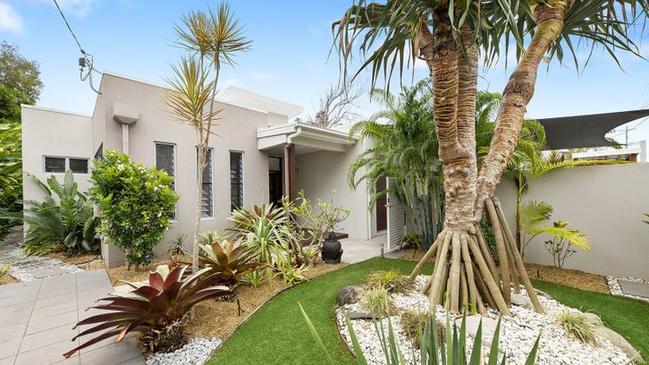 With a price guide of $1.8M, this Coolum Beach house has recently hit the market