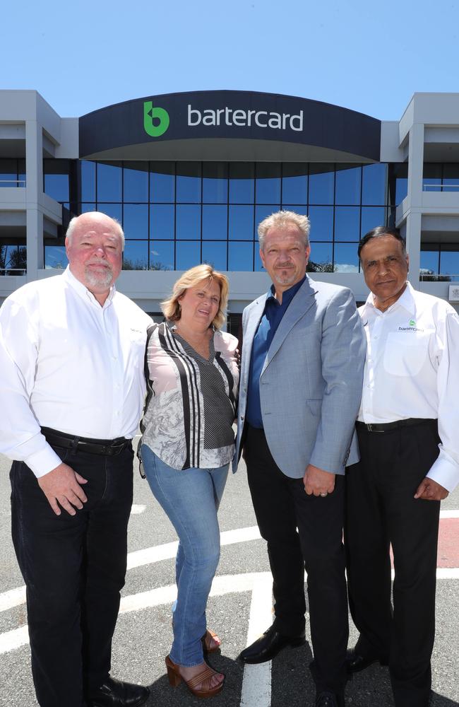 Tony Wiese, Maree St. Clair, Andrew Federowsky and Raj Pathak at their Southport office of Bartercard. Picture: Glenn Hampson