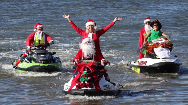 Jane Padden (centre) promoting the charity’s Santa Jet Ski Ride in 2020. Picture: Glenn Hampson.