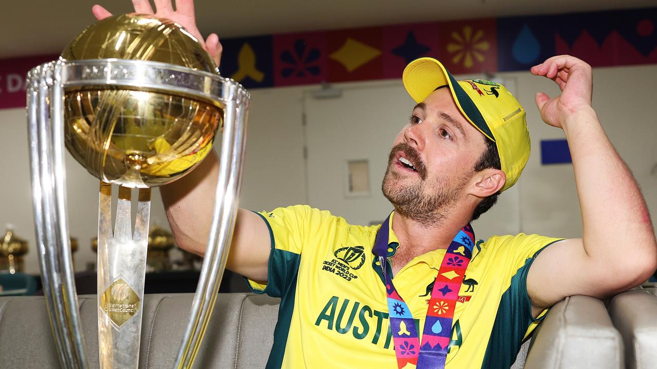 Travis Head with the World Cup trophy in 2023. Picture: Matthew Lewis-ICC/ICC via Getty Images)