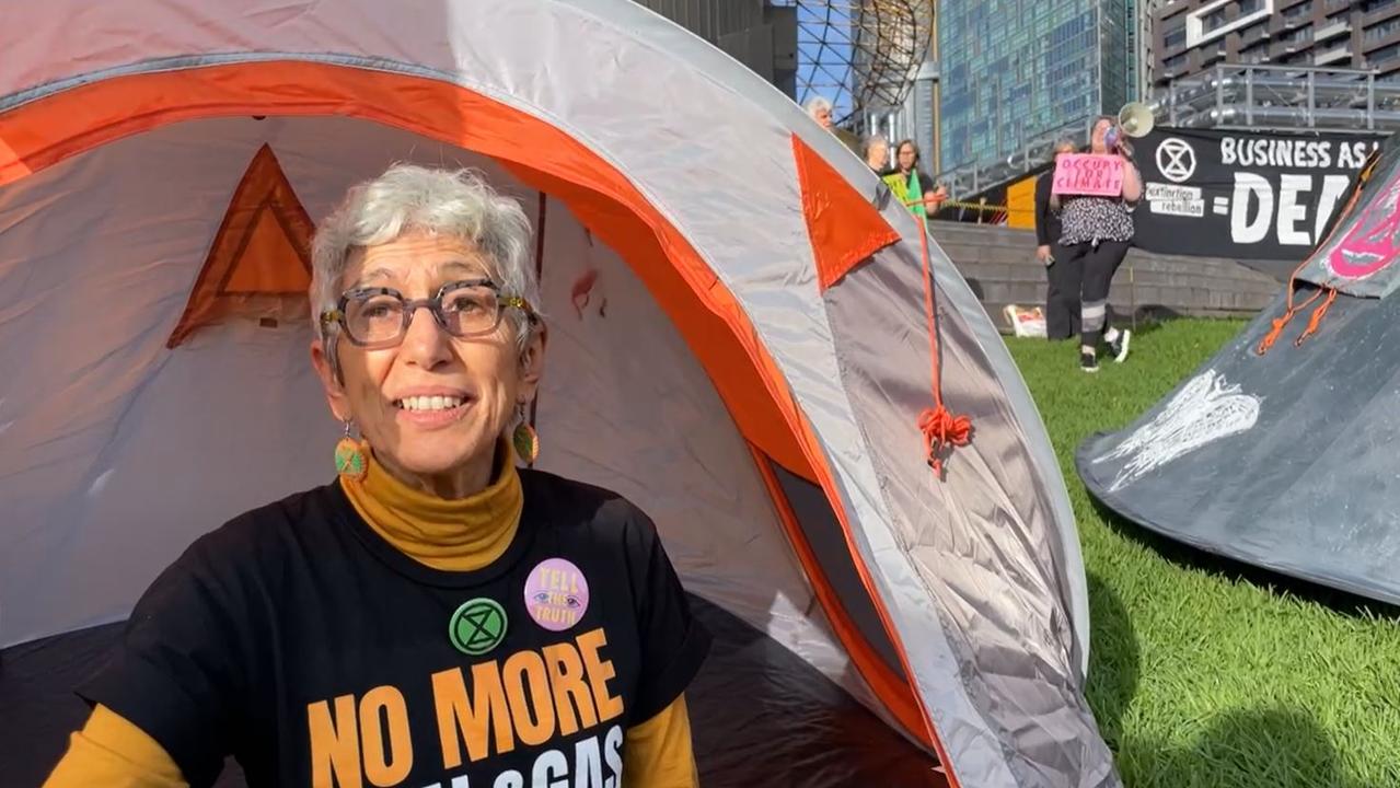 One of the protesters on the ground talking on a livestream. Picture: Facebook