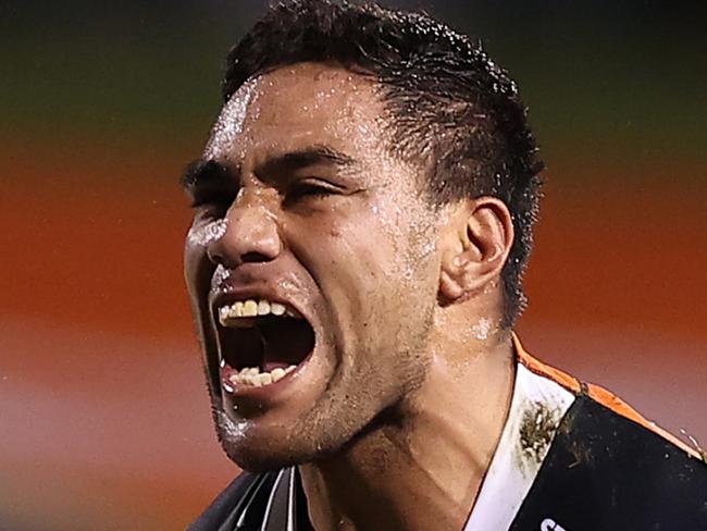 SYDNEY, AUSTRALIA - JULY 04: Joe Ofahengaue of the Tigers shows his emotions during the round 16 NRL match between the Wests Tigers and the South Sydney Rabbitohs at Leichhardt Oval on July 04, 2021, in Sydney, Australia. (Photo by Mark Kolbe/Getty Images)