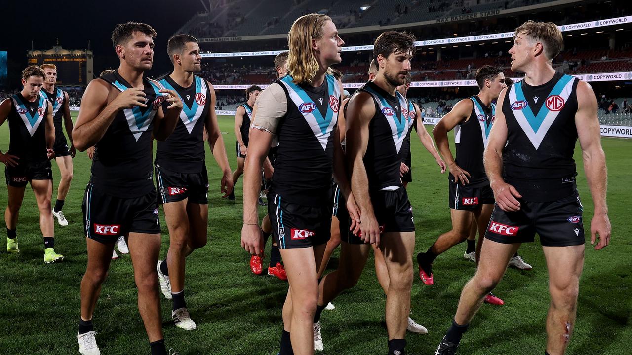 The Power players make their way from the field after another disappointing performance. Picture: AFL Photos via Getty Images