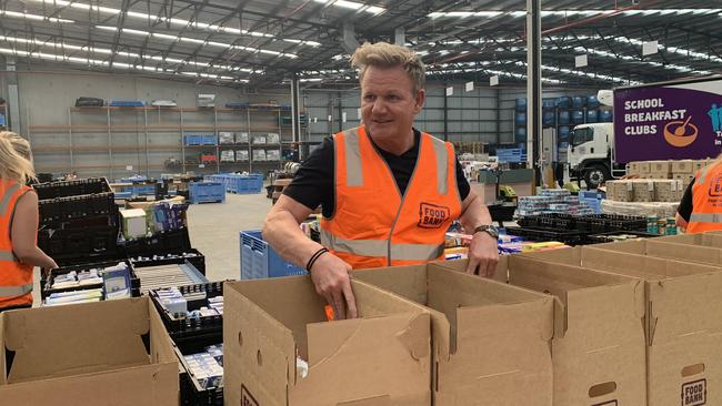 Gordon Ramsay packing hampers at Foodbank Victoria during the bushfire crisis in January.