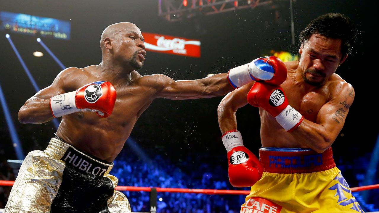 Floyd Mayweather Jr. and Manny Pacquiao set records around the world. Picture: Al Bello/Getty