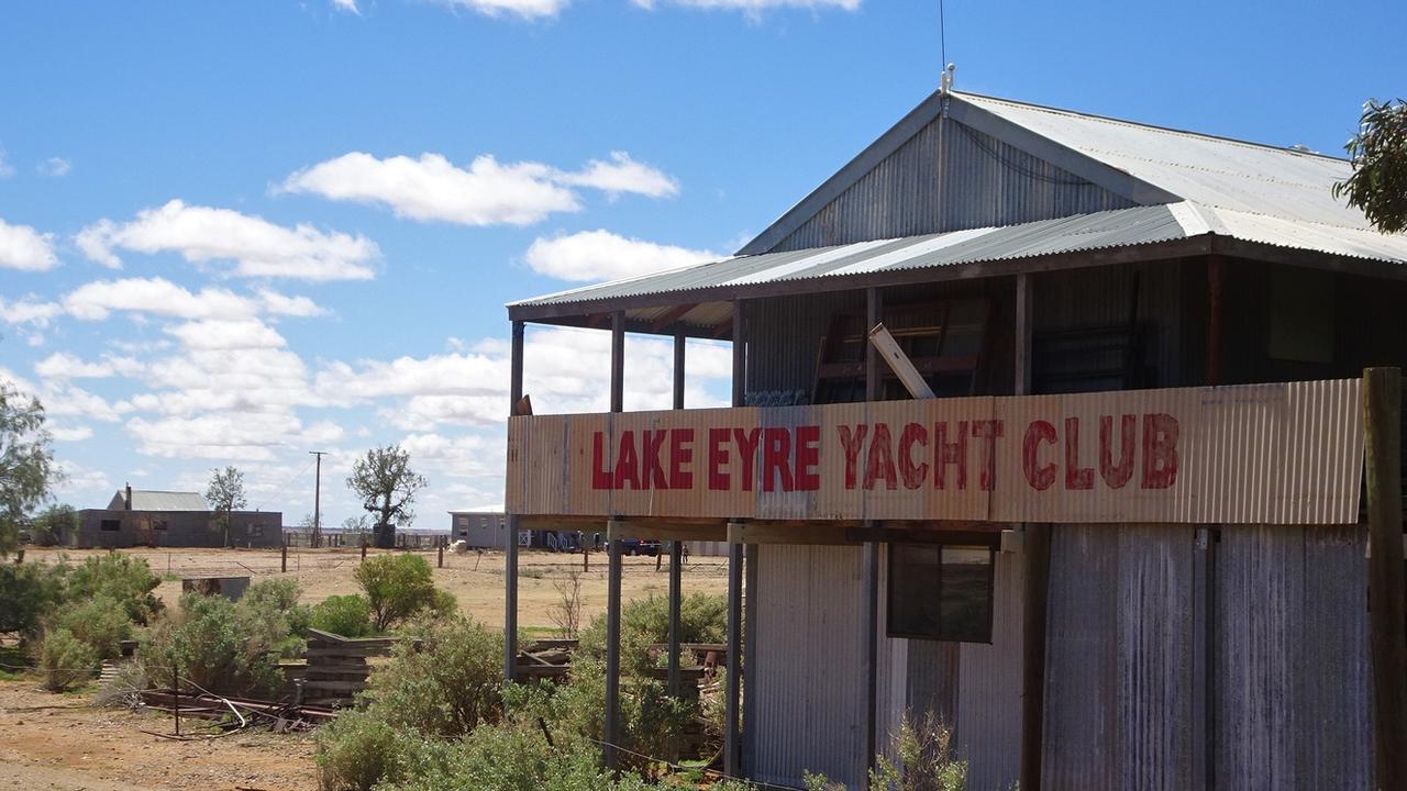 what does lake eyre yacht club slogan mean