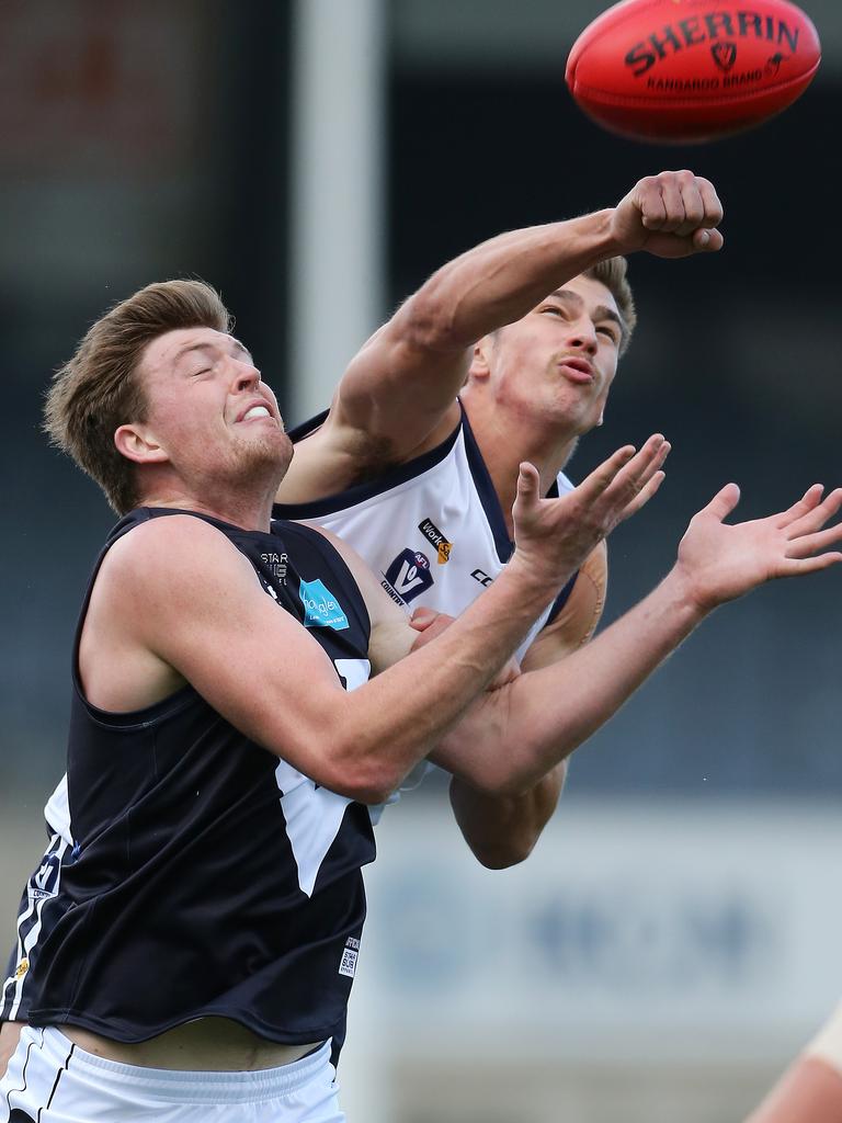 Vic Country’s Nathan Cooper and VAFA’s Harry Thompson at Ikon Park, Carlton. Picture: Yuri Kouzmin