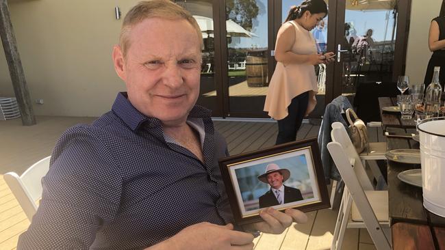 Richard Beasley with a picture of Barnaby Joyce.