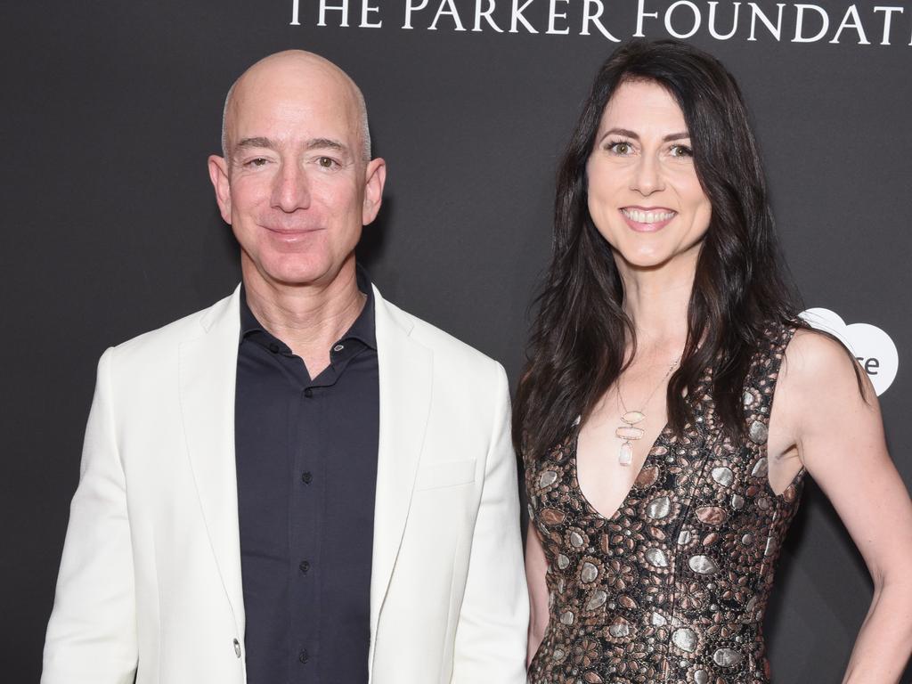 Jeff Bezos with wife MacKenzie. The pair split after 25 years of marriage and the Amazon boss is now linked to TV anchor Lauren Sanchez. Picture: Getty Images