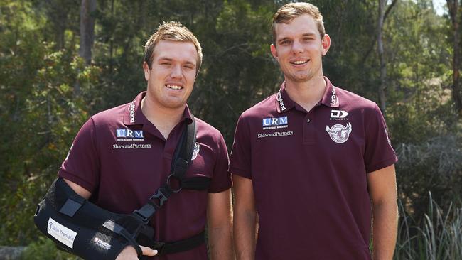 Jake Trbojevic. pictured with brother Tom after re-signing with Manly in November, is recovering from shoulder surgery. Picture: Getty Images