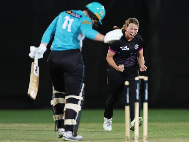 Sixers bowler Caoimhe Bray celebrates the wicket of Heat batter Laura Harris during the T20 Spring Challenge match at North Sydney Oval, October 12. (Photo by Matt King/Getty Images)