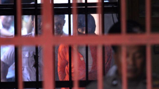 Australian Lamar Aaron Ahchee escorted back to the cell at Bali Police HQ after interrogation on May 28, 2025. Picture: Lukman S. Bintoro