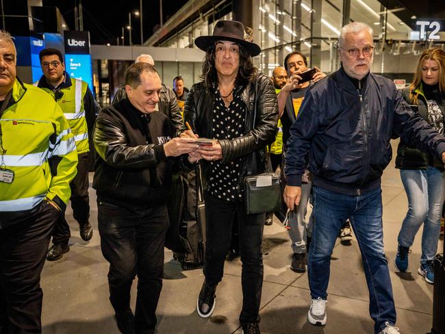 Paul Stanley signs autographs for fans upon arrival at Melbourne Airport to begin the Australian leg of the End of the Road Tour. Picture: Jake Nowakowski