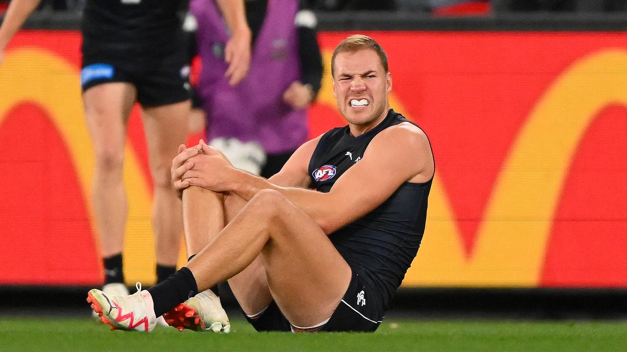 Harry McKay of the Blues reacts to an injury. Picture: Morgan Hancock/AFL Photos via Getty Images