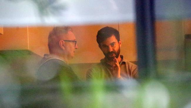 NSW Minister Don Harwin, left, at his house in Pearl Beach with Geoffrey Winters on Wednesday. Picture: Christian Gilles