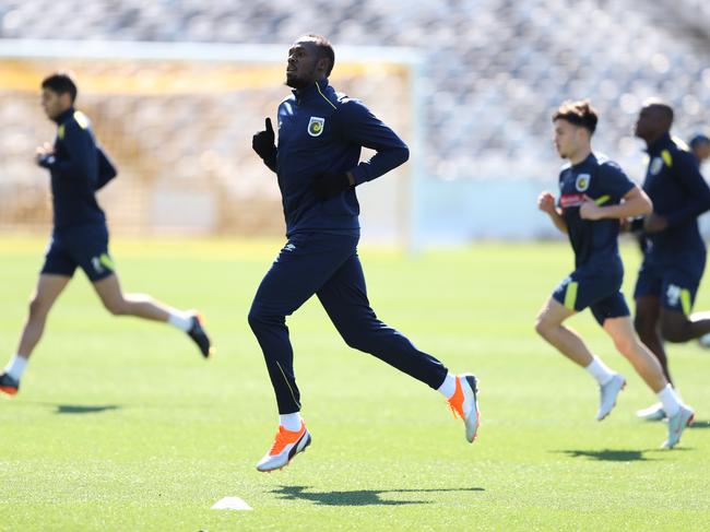 Bolt looked comfortable during the warm up sprints. Picture: Brett Costello