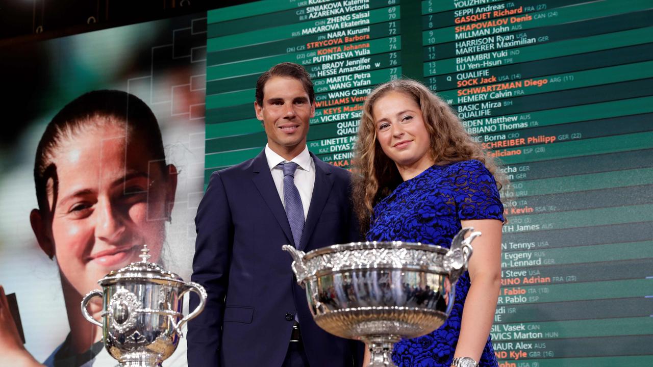Rafael Nadal poses with Jelena Ostapenko after the official draw ceremony for the Roland Garros 2018 French Tennis Open.