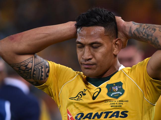 Wallabies player Israel Folau reacts following the First Test between the Australia Wallabies and the England Roses at Suncorp Stadium in Brisbane, Saturday, June 11, 2016. (AAP Image/Dave Hunt) NO ARCHIVING, EDITORIAL USE ONLY