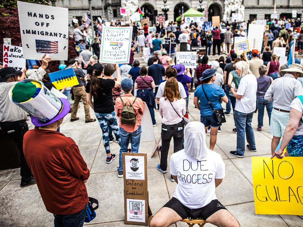 Protesters rally at the state capitol in Harrisburg, Pennsylvania, during the Day of Action protest against the Trump administration. Picture: AP