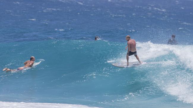 Former World Champion surfer Mick Fanning enjoying the large swell at Snapper Rocks on Sunday 2 January 2022. Picture: Jerad Williams