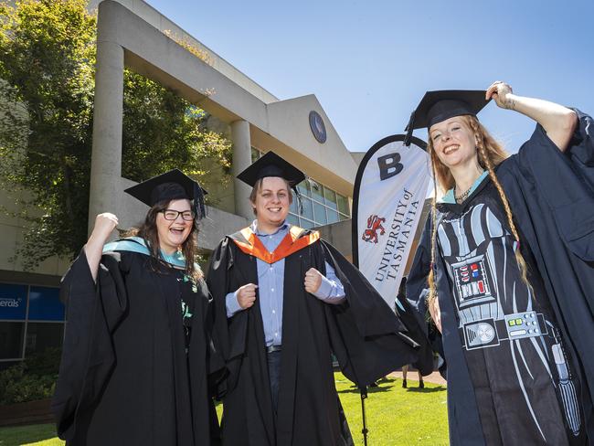 (L-R) Jess Chalk (Bachelor of Education), Zachery Hampson (Bachelor of Business) and Cat StEvens (Master of Teaching) at the UTAS Graduation at Burnie. PICTURE CHRIS KIDD