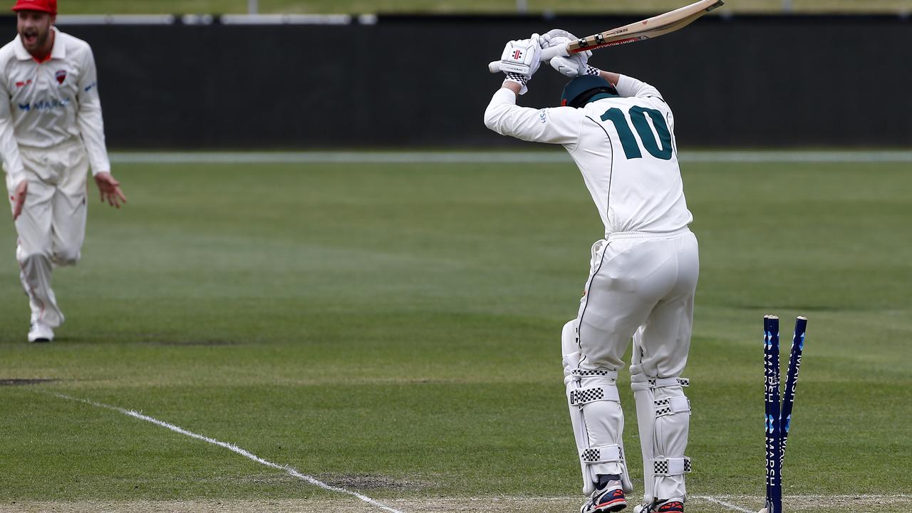 Tasmanian batsman George Bailey is bowled first ball by Wesley Agar in his final first class innings.