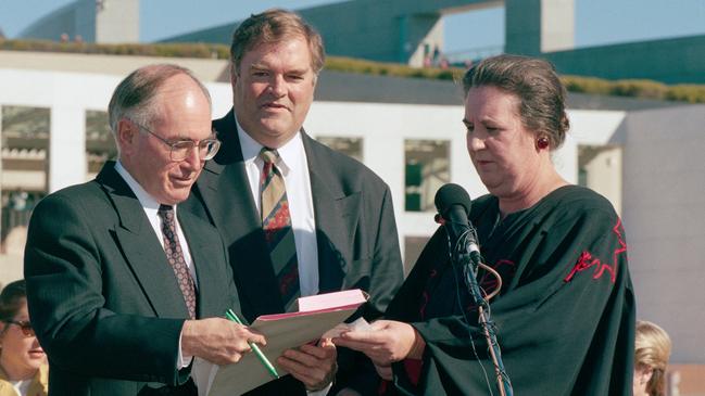 Then-prime minister John Howard and opposition leader Kim Beazley accepting a petition advocating changes to firearms legislation and a nationwide amnesty following the Port Arthur massacre, May 1996. Picture: News Corp Australia