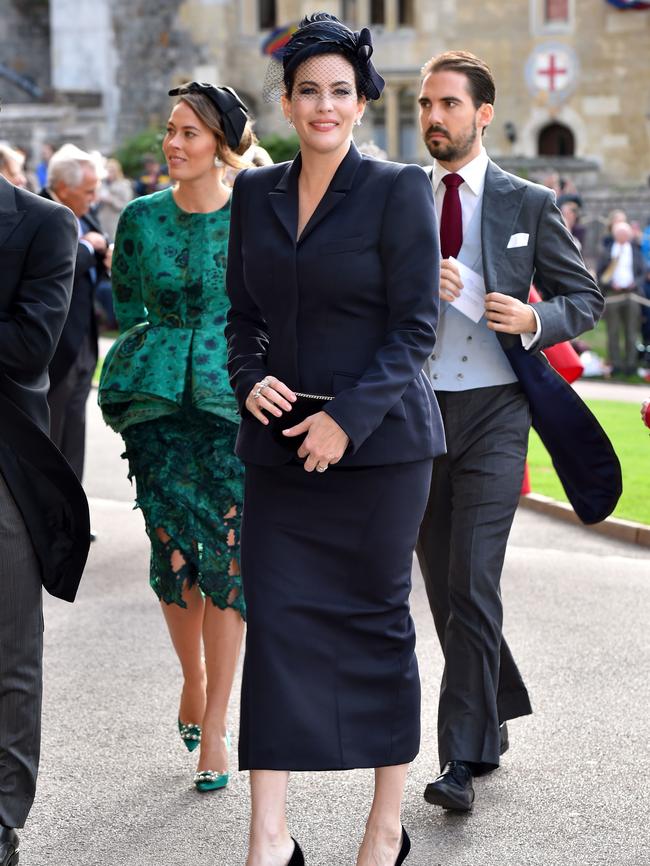 Liv looked polished in navy with a matching fascinator. Picture: AFP