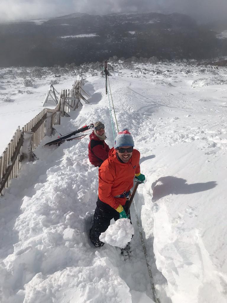 Heavy overnight snow at Mt Mawson ski field in Mt Field National Park covered over the tow rope, and volunteers had to dig it clear. June 13, 2022.