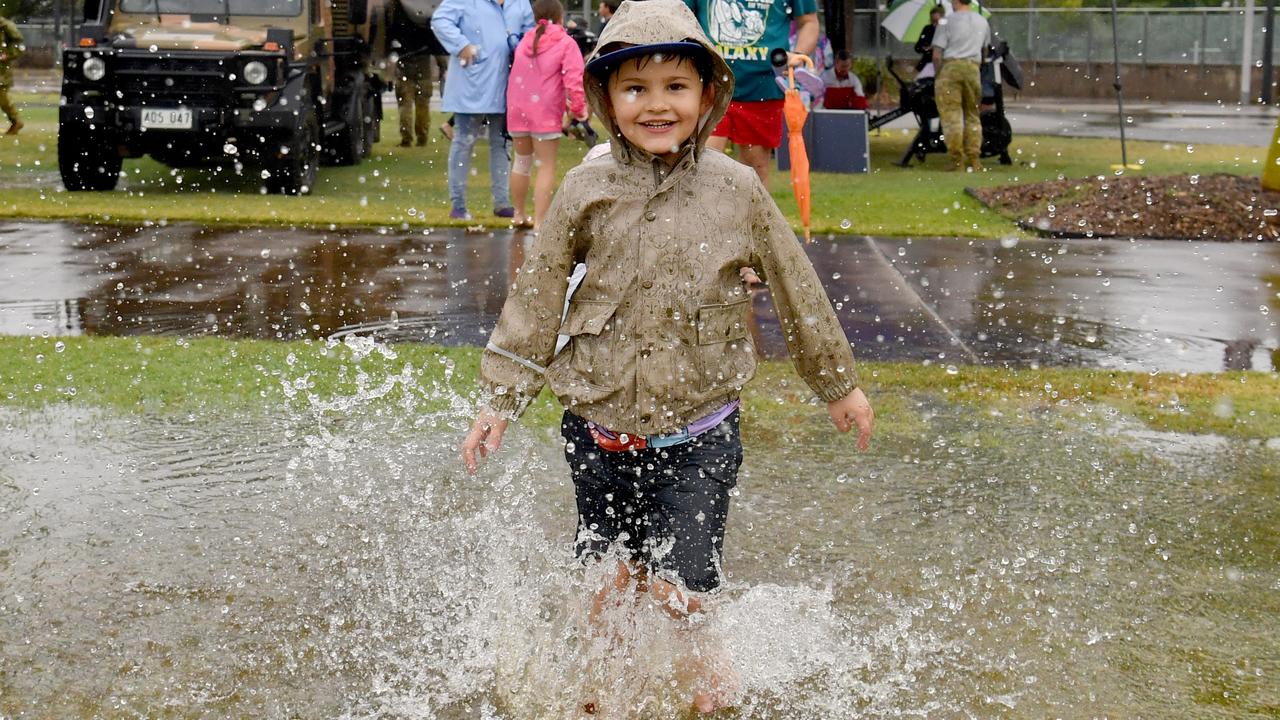 MaxMalan, 5, enjoying the wet weather at the North Queensland Army Open Day at Riverway Stadium on Sunday. Picture: Evan Morgan