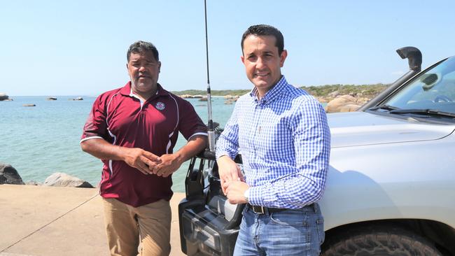 Lockhart River Mayor Wayne Butcher and Opposition leader David Crisafulli discuss indigenous vaccination rates at Lockhart River. Picture: Peter Carruthers