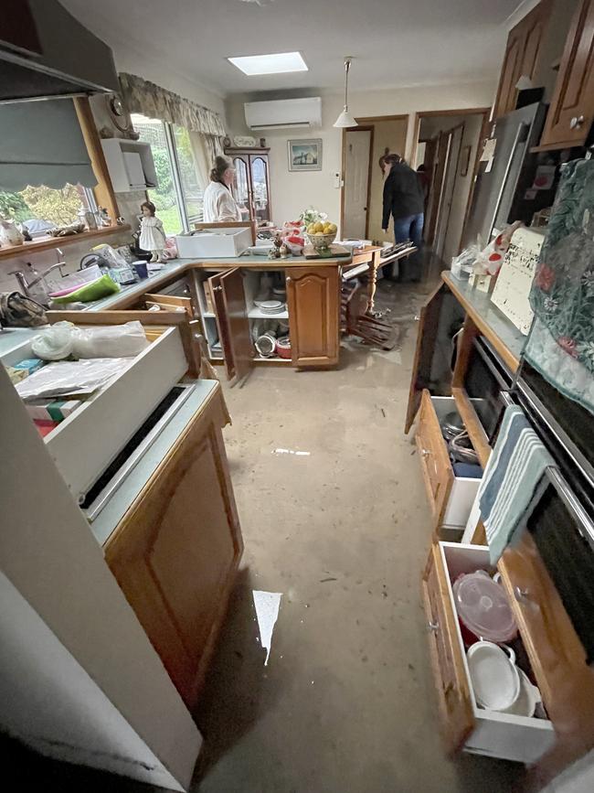 Margaret and Philip Powe (Powe) of Berriedale had flood water inundate their entire home during the recent heavy rain in Hobart and have lost everything that was in the house. Picture: Janette Good